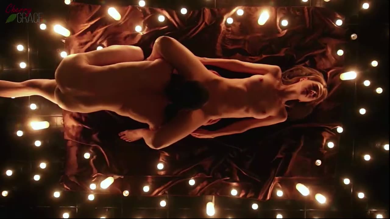 Romantic Intimacy by Candlelight in the Dim Glow, Shot from Above